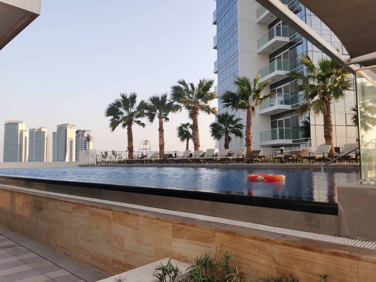 Successful Airbnb property: GharFar-2 Heaven Escape- Golf View-High floor-pool in Al Hebiah Third
