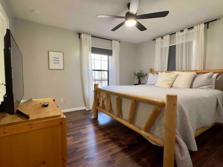 Comfortable primary bedroom offering a quiet retreat after a day on the trails or golf course.