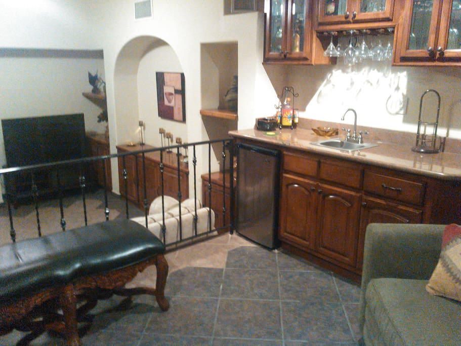 Wet bar and den below.
