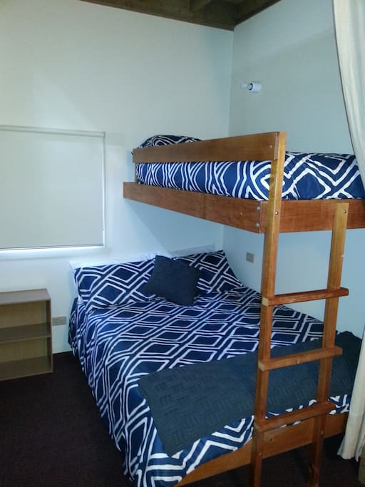 Double and single bed on the landing (Curtains to make area private)