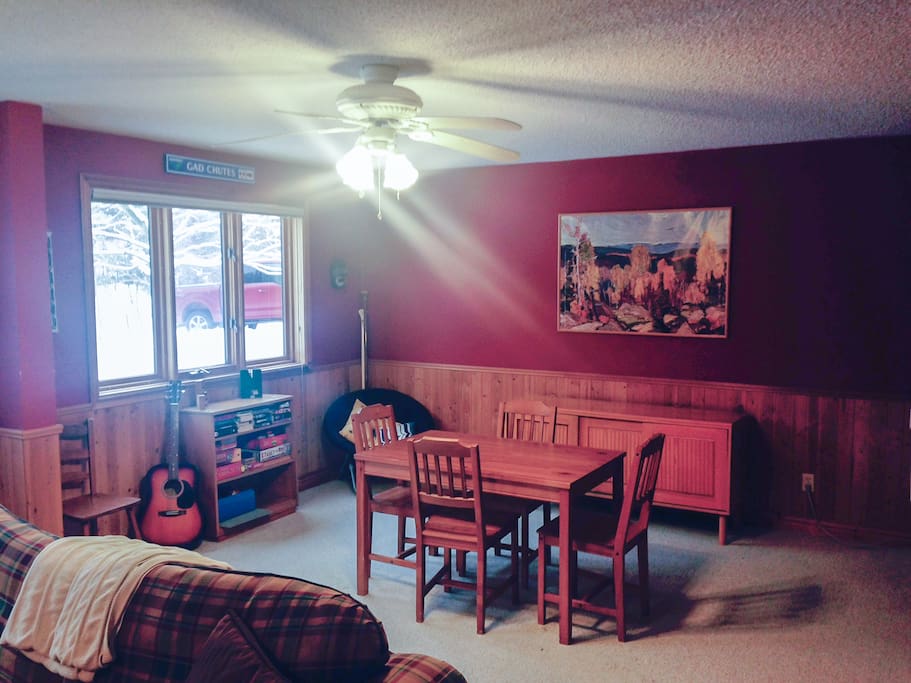 Living room with table for eating and games