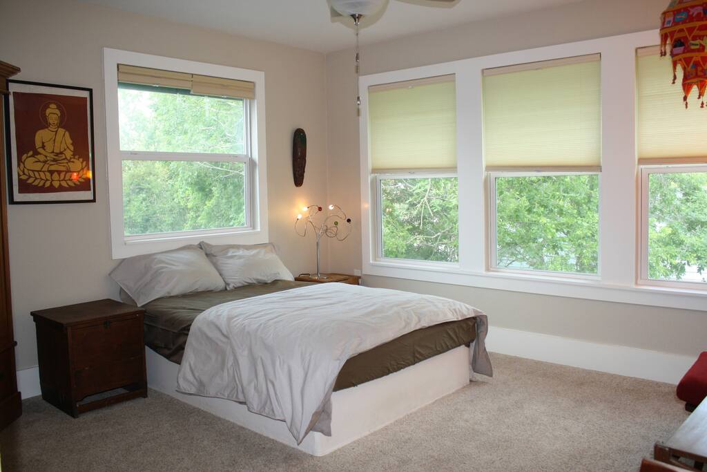 The Treehouse Bedroom offers five windows spanning the treeline, and is truly magical. Firm mattress with a pillow-top, luxury sheets, a feather duvet and ceiling fan ensure a peaceful slumber.