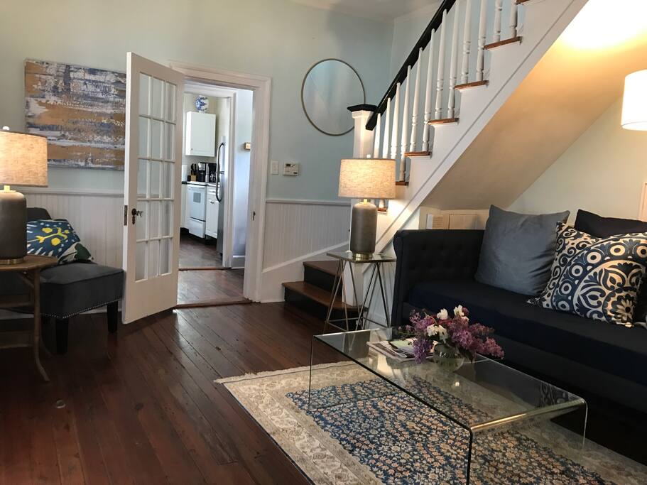 Cozy living room with 48" tv with cable and on demand. Original heart pine flooring.