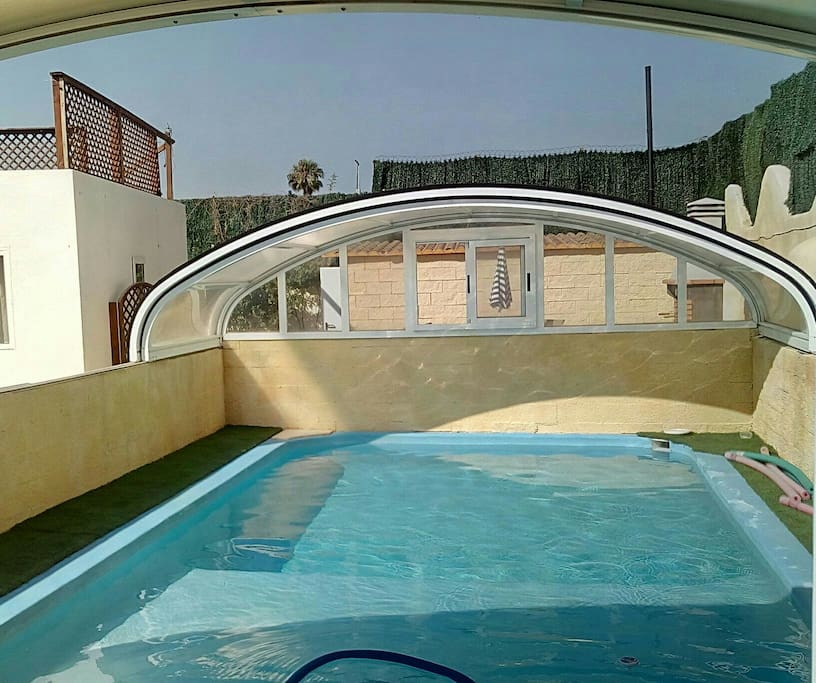 leisure pool in summer with the roof retracted