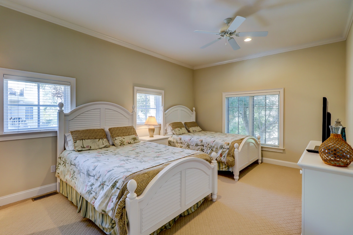 Second of three bedrooms on main floor.  This bedroom features two queen beds with walk-in closet and ensuite bath.