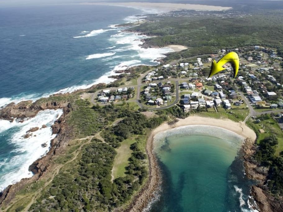 Boat Harbour in the foregoround, Kingsley Beach behind and the rocky coastal fringe to the left for exploring and great walks, with the house right in the middle! Burubi or Stockton Beach in the distance at the top of the photo.