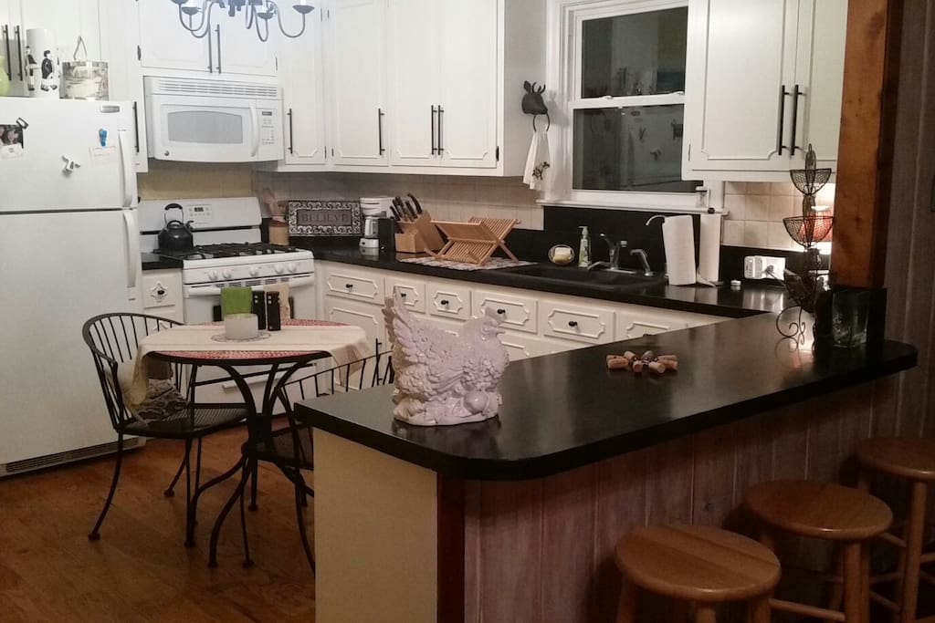 Come, sit at the counter and chat with whoever is cooking!