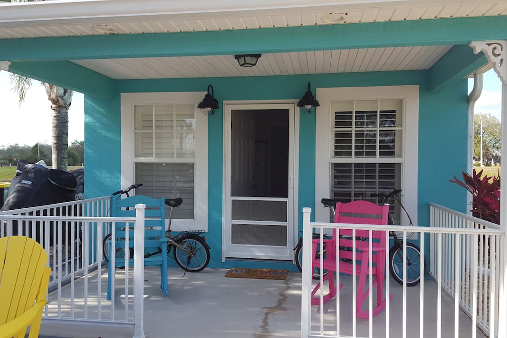 Front porch has an incredible view of Lake Mattie from its rocking chairs