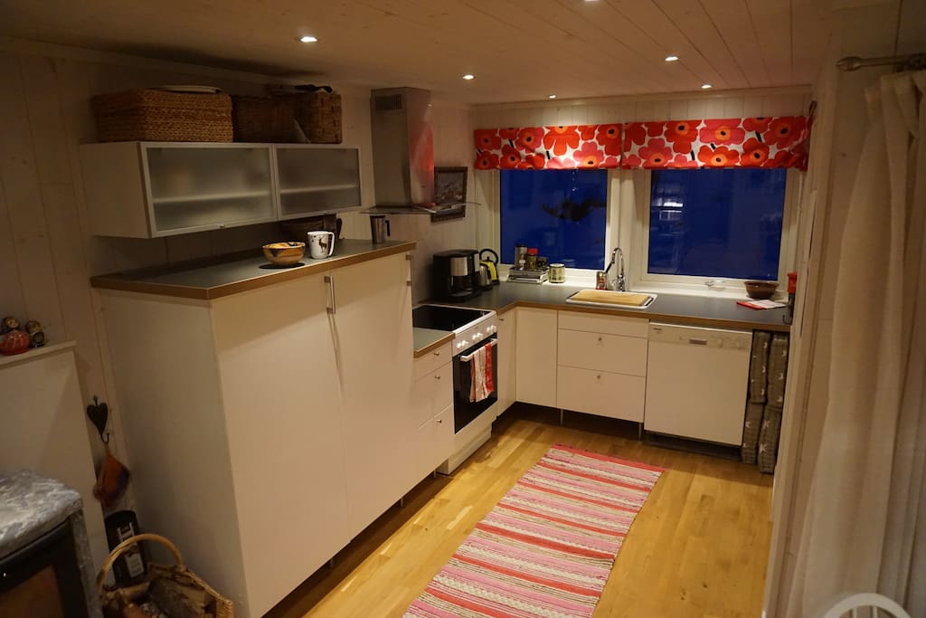 The kitchen includes a fridge, dishwashing machine, stove, etc. All you need for 12 persons.