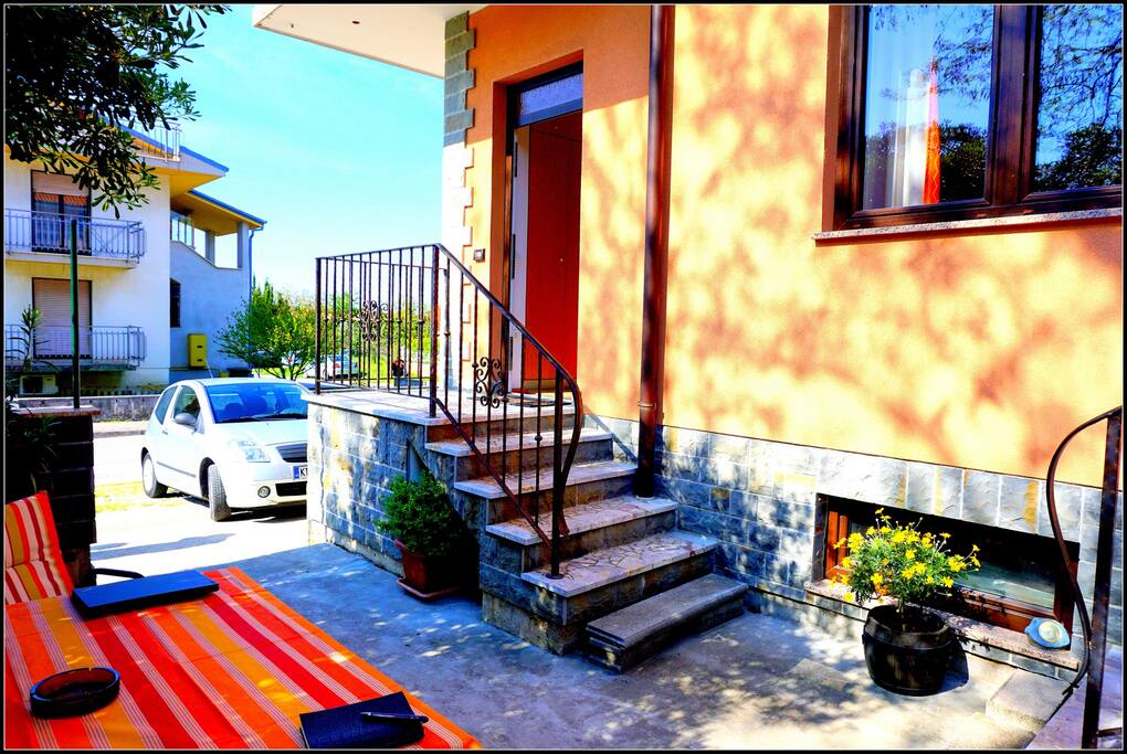 Your entrance and terrace with sitting area