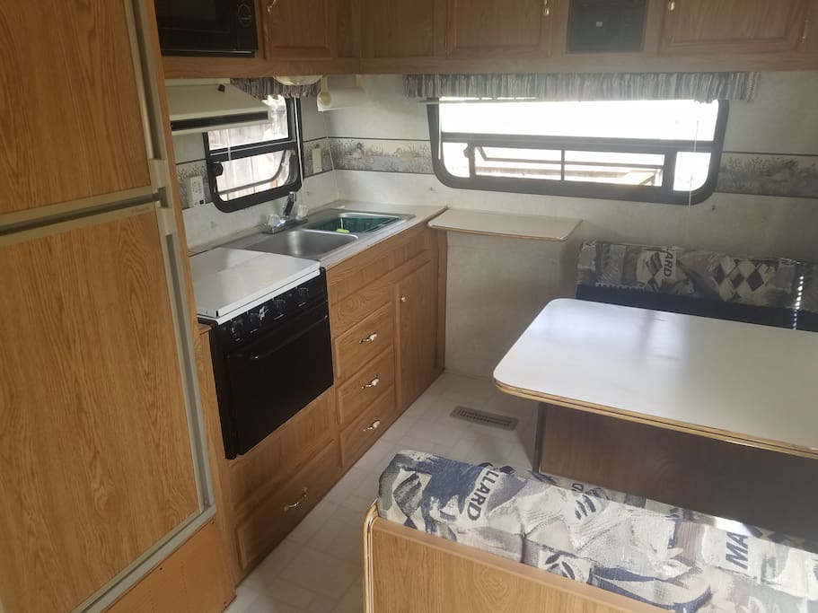 Kitchen with fold down table/bed