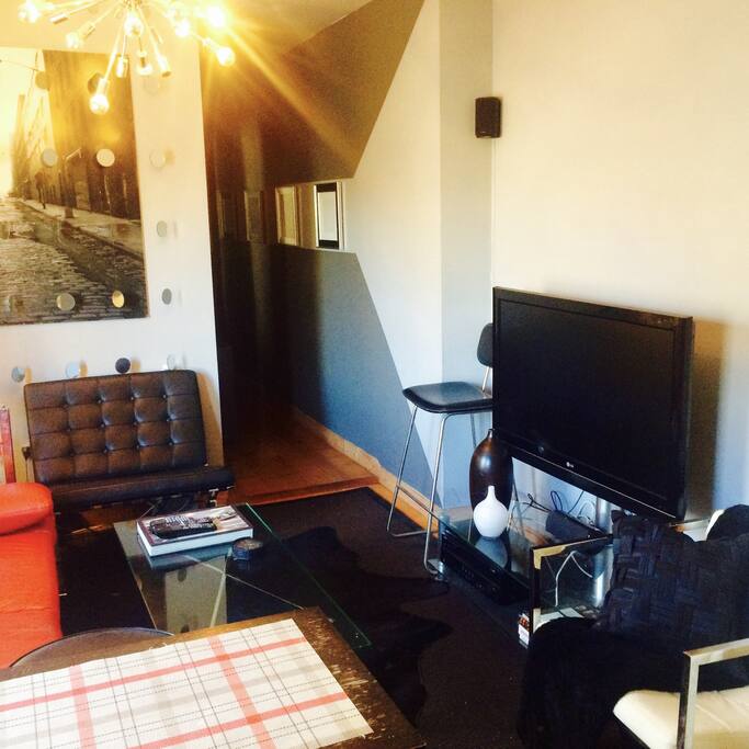 Living room with large screen TV.
