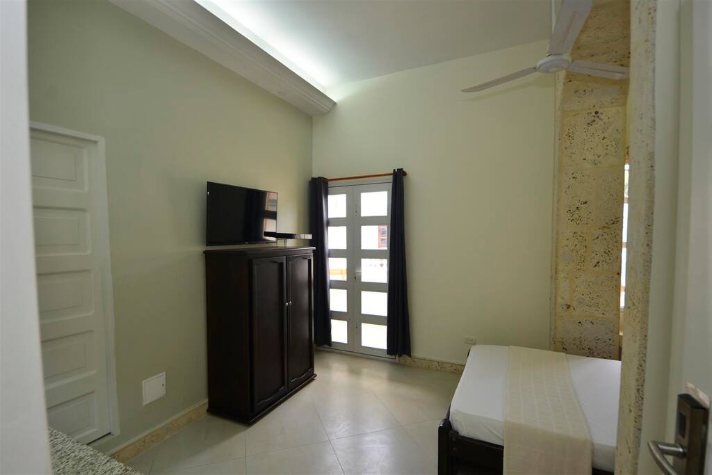 Elegantly remodeled studio apartment with private balcony in historic building