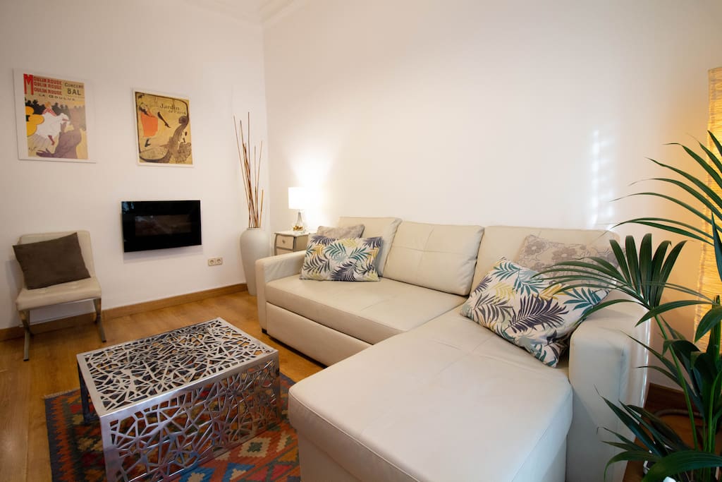 Salón con sofá cama