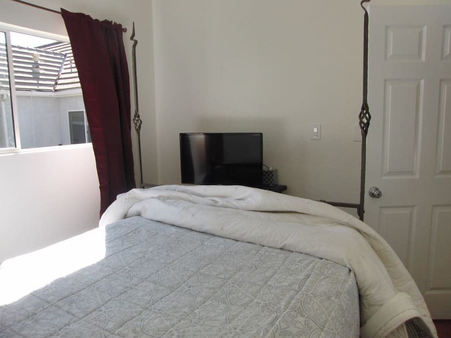 Queen bed with private full bath. Own separate entrance off driveway.