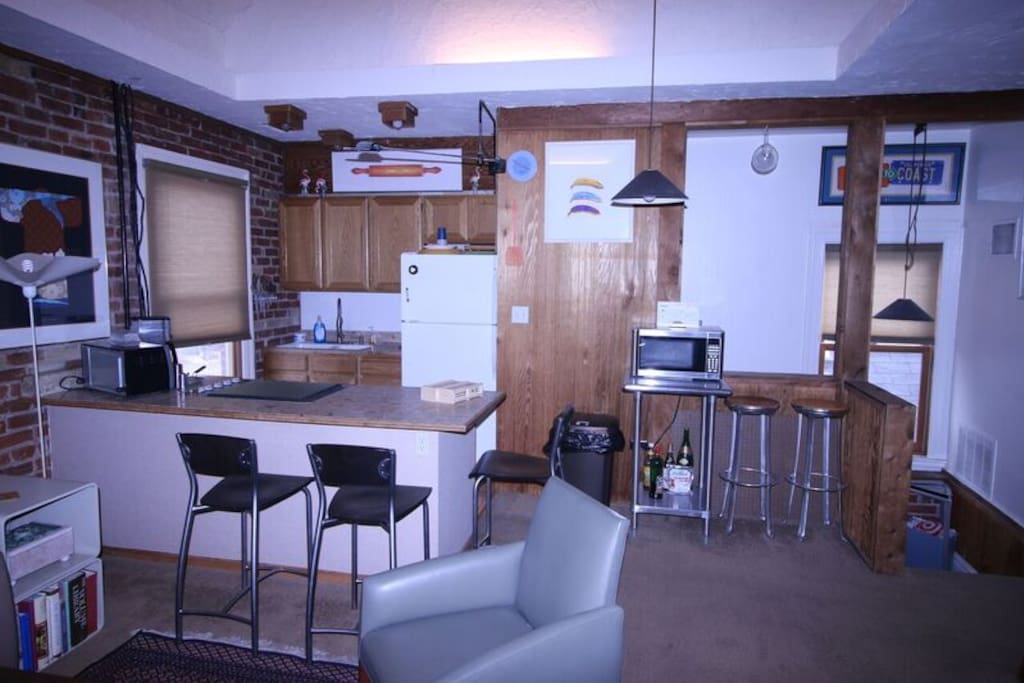 Full kitchen with counter stool seating