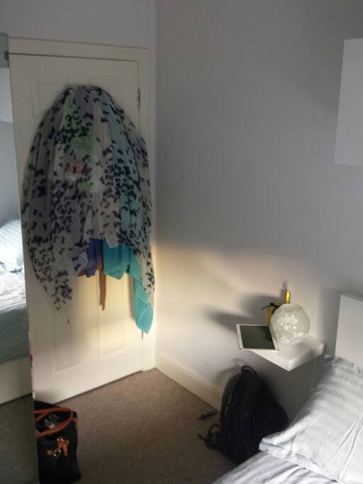 Bedroom has hooks on door
