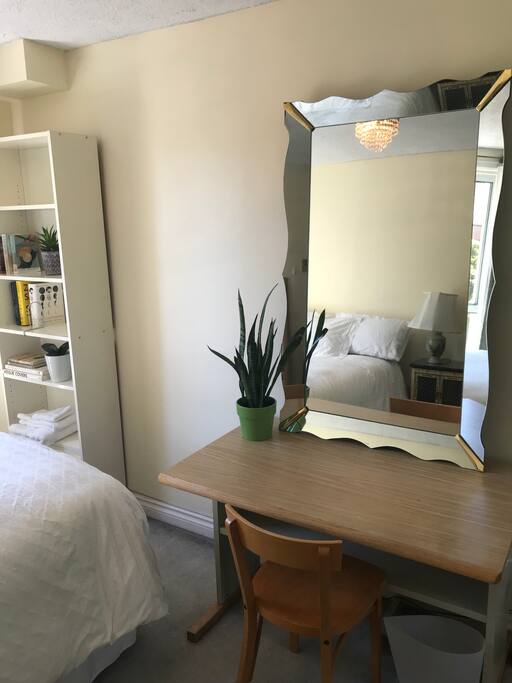 Beautiful mirror feature on desk reflecting the sunny room.