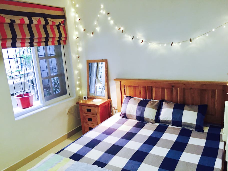 Our queensize bed with natural latex mattress for 2 guest. There is also a large wardrobe inside the bedroom.