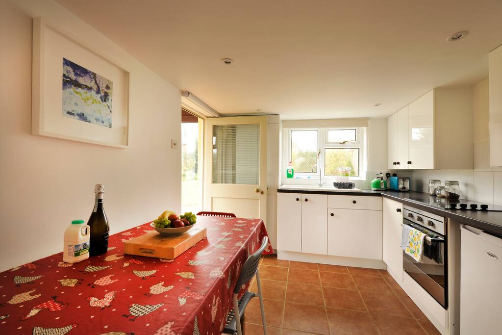 The kitchen with small table seating up to 6.