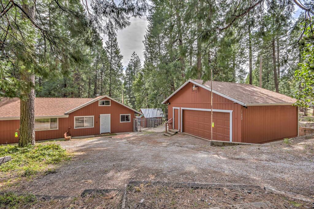 Wood paneling, 2 wood-burning stoves, and rustic decor make this 1,200 square foot home cozy and comfortable.