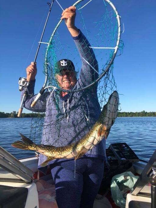 YOUR HOST: SYLVIA -- caught a big one: 30" Northern Pike and 7 lbs. - JULY 19 at 6:00 a.m. on BIG RIDEAU LAKE -- Way to go Sylvia !!!!!!