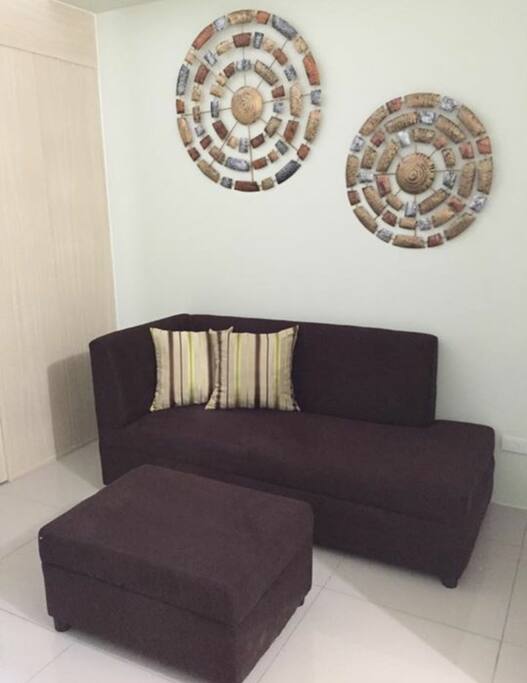 3 seater sofa with 1 foot rest