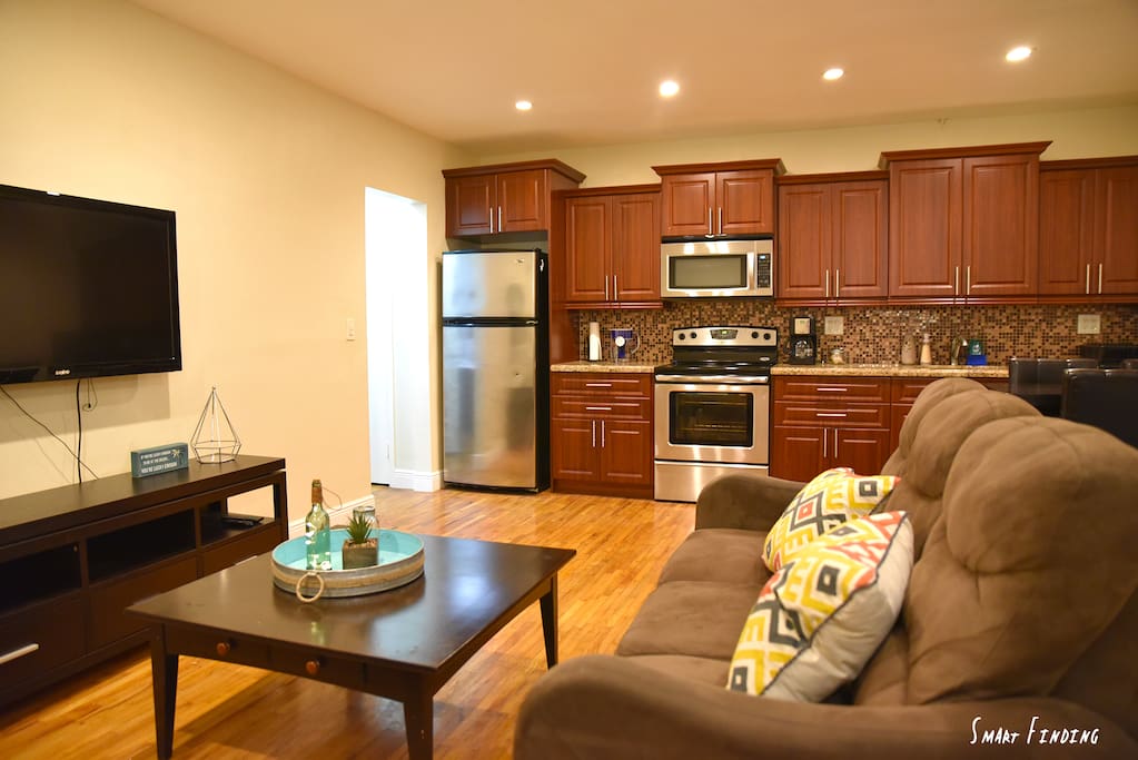Kitchen and sofa with Tv
