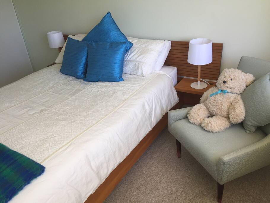 Light filled bedroom with Big Ted (optional caretaker)