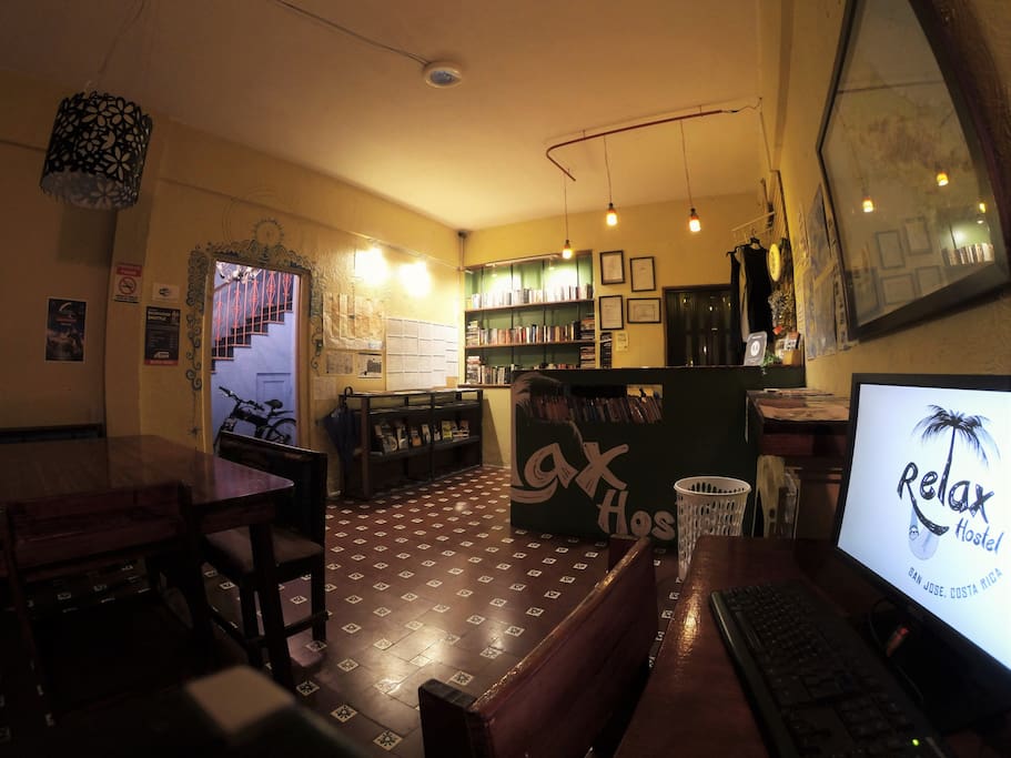 A view of the reception, computers, and front table.