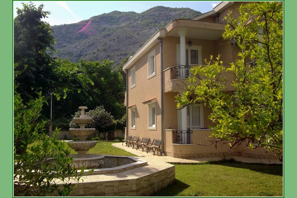 Large fountain in front of the villa