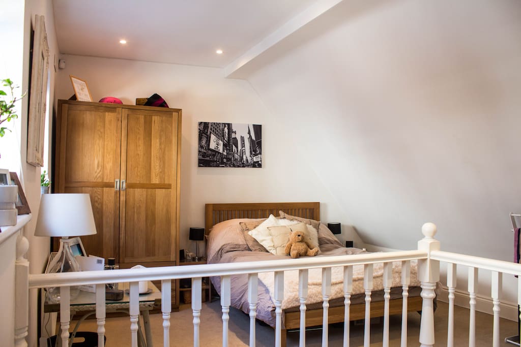 A very spacious double bedroom with two large windows which make the space very light and airy.