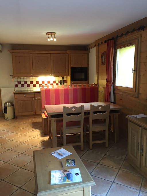 Dining area with kitchen beyond, viewed from the lounge