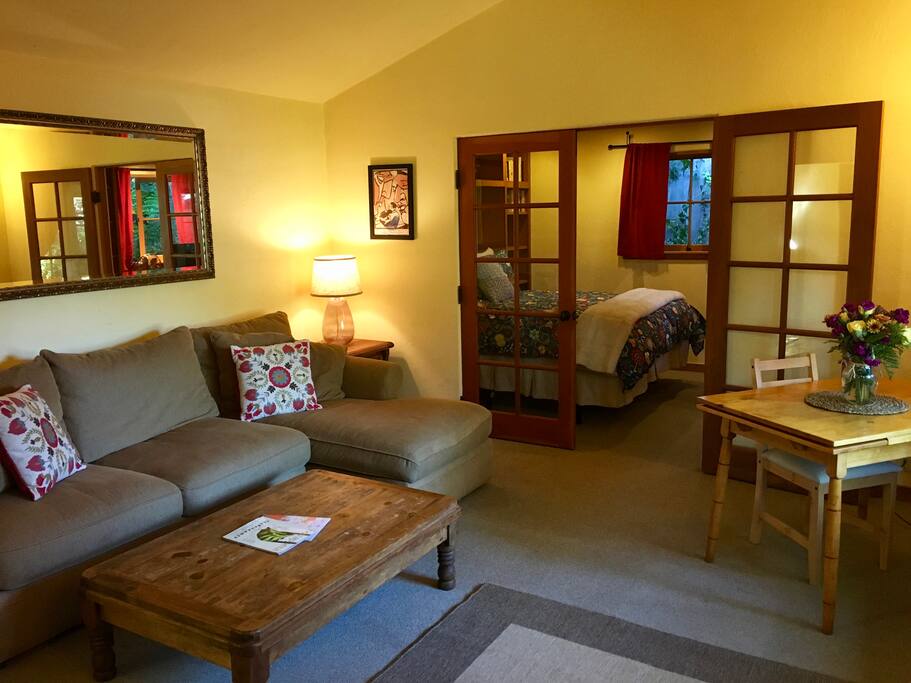 Living room with chaise sofa that pulls out into bed