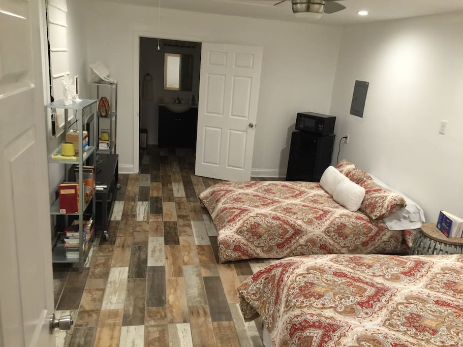 Room view with microwave and fridge.