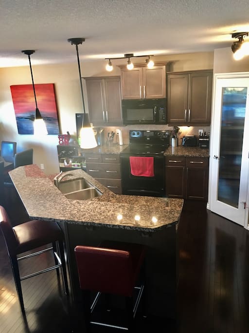 Kitchen island with raised eating bar