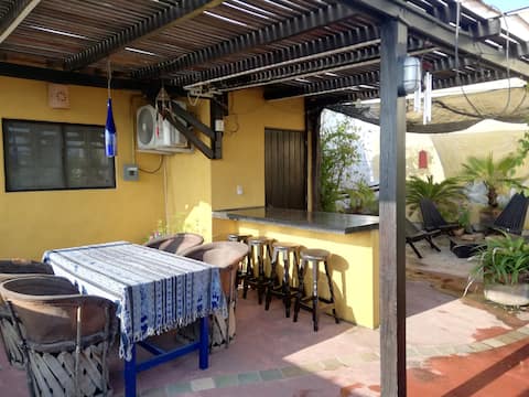 Top performing Airbnb: Apartment with a flower-filled terrace and fountain in San Patricio (Melaque)