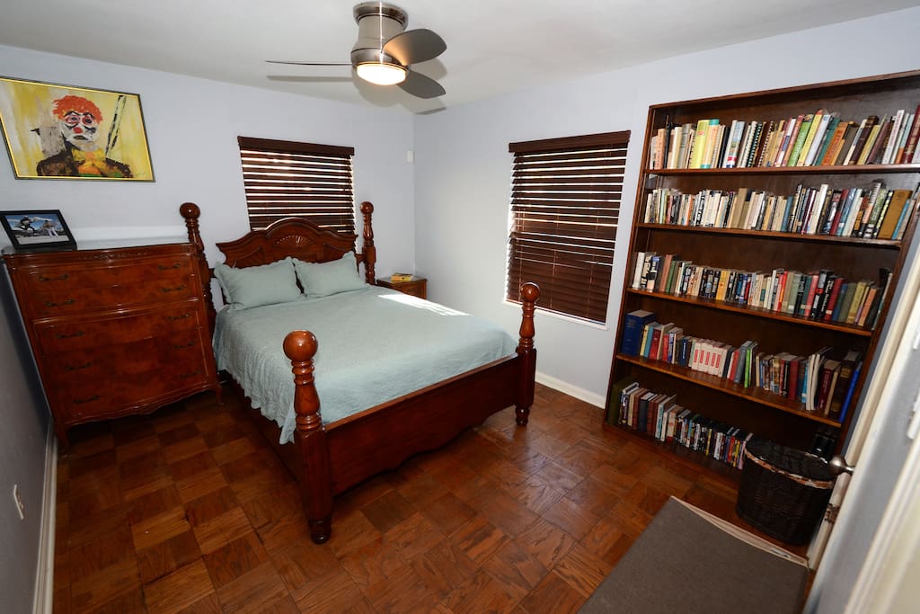 Master bedroom with books for you to relax.