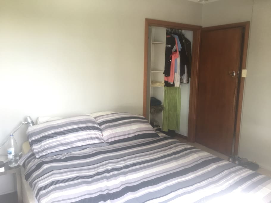 Bed and wardrobe space