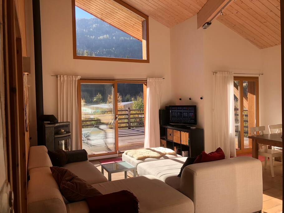 Modern apartment w open space living room (6m ceiling height) integrated with modern fully equipped kitchen and 2 separate bedrooms. Panoramic windows and sliding doors onto large private terrace.