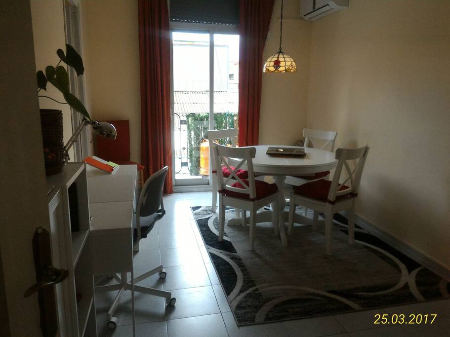 Light living room with balcony door.