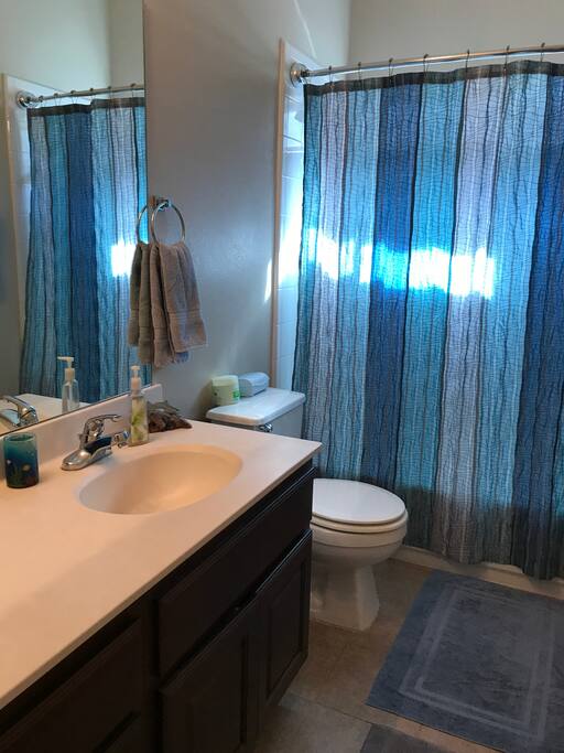 Dedicated bathroom for guest with great counter space.