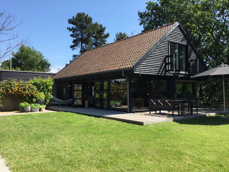The huse seen from our garden, plenty of space for playing and having a nice time.