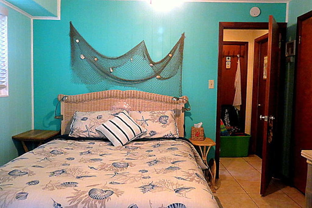Bedroom.
Beach toys in the green bucket.