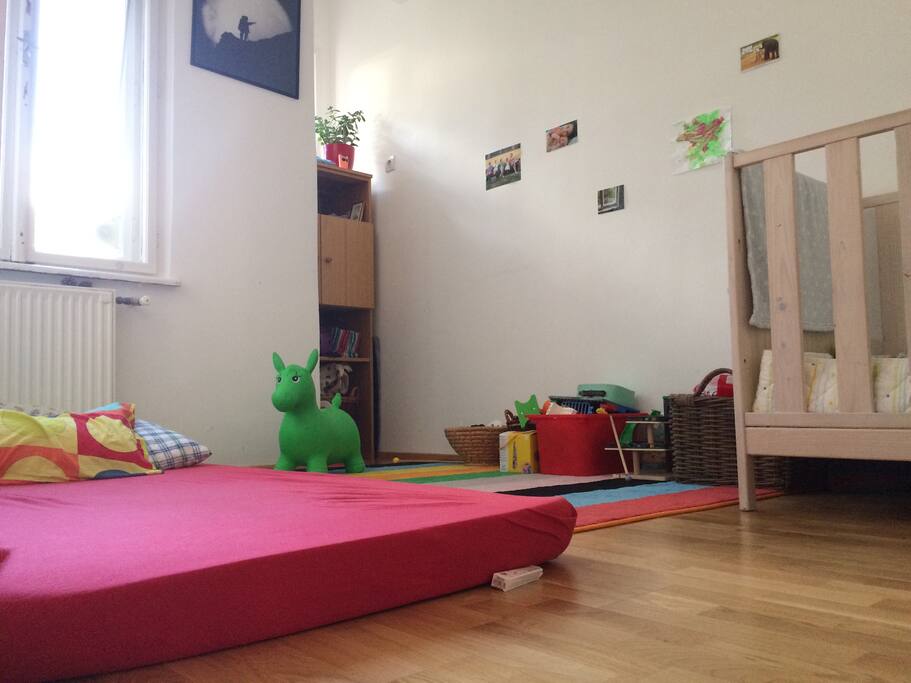 Bedroom 2 with matrace and cribs