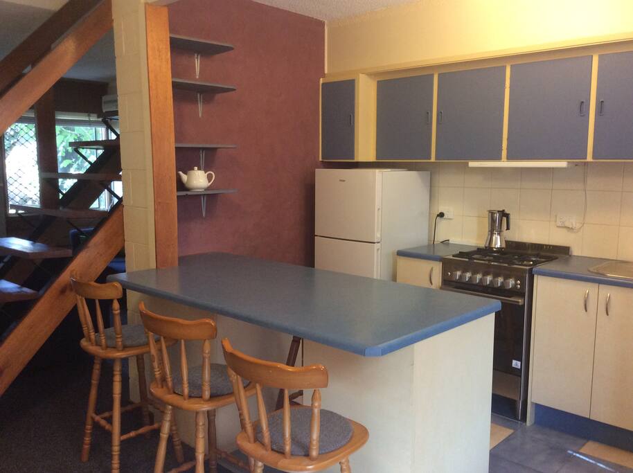 New Gas cooker, fridge, kitchen bench with 4 stools.