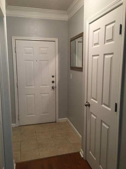 Entry way with very tall ceilings throughout