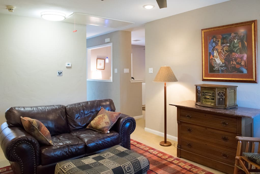 Large living area greets you as you step into your relaxing space for a welcoming stay.
