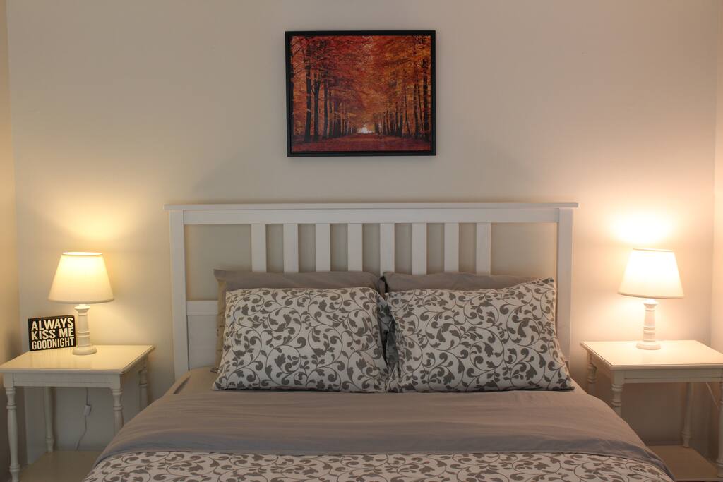 Private Bedroom with laundry room & bathroom access.
