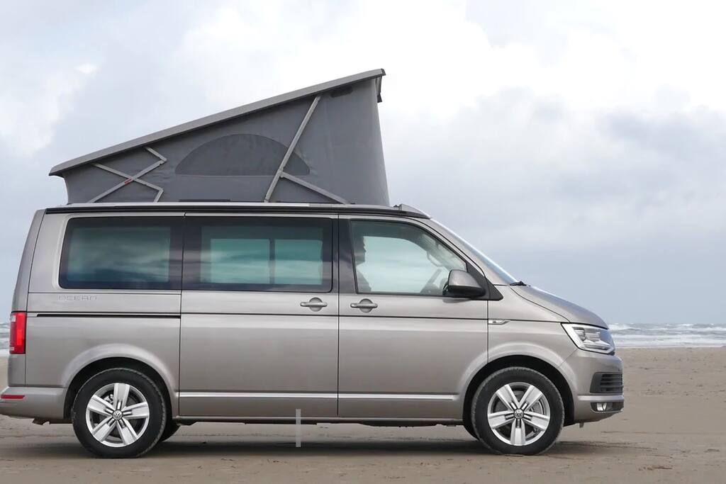 The roof is electric! Goes up in seconds to give full headroom or a second double bunk